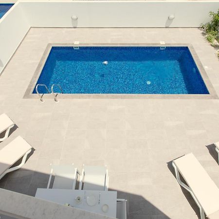 Palm Tree Villas Livadhia Exterior photo