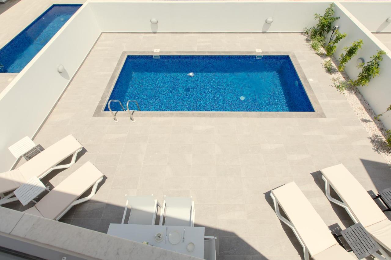 Palm Tree Villas Livadhia Exterior photo