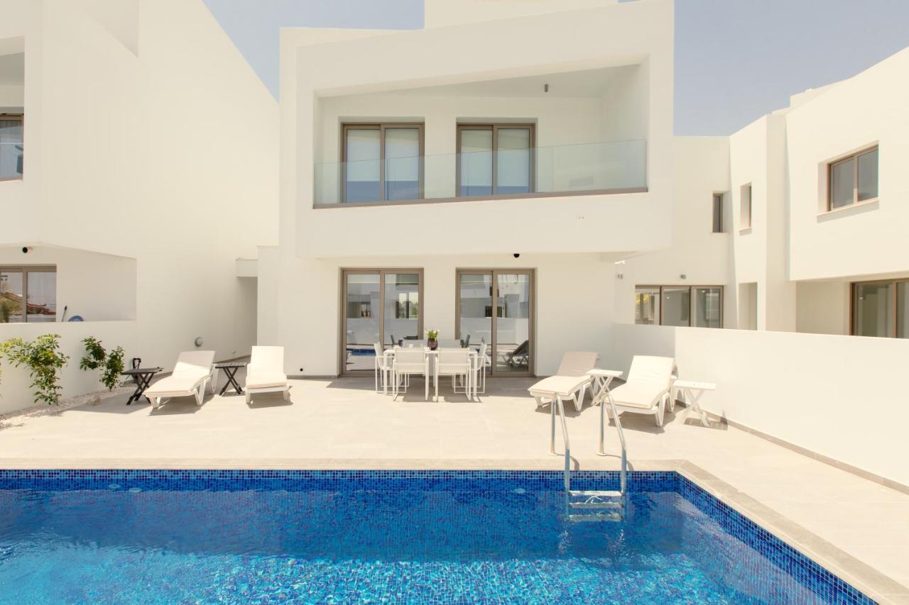 Palm Tree Villas Livadhia Exterior photo